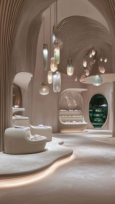 an artisticly designed room with white furniture and hanging lights