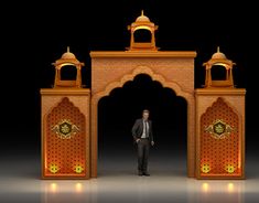 a man standing in front of an archway