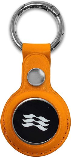 an orange leather keychain with a black and white logo on the bottom half