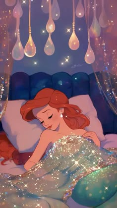 the little mermaid is laying in her bed with bubbles hanging from it's ceiling