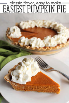 a slice of pumpkin pie with whipped cream on top and the rest of the pie in the background