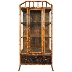 an antique china cabinet with glass doors