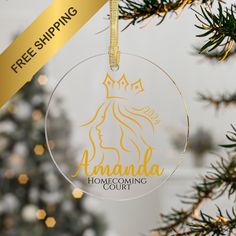 an ornament hanging from a christmas tree with the words, amanda home coming court