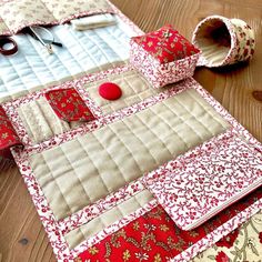 the table is covered with red and white quilts