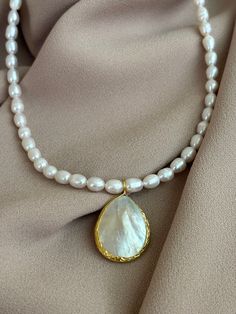 NEW ! Conch Pearl Necklace, Elegant Barley Pearl Gold Necklace, Real Baroque Pearl Necklace, Gift for Love, Wedding Jewelry, Gift for Mother Stylish Touches ! Our necklaces, which we have prepared in the sizes you want with drop-shaped seashell pearl pendants and barley pearls, will be indispensable for you. This classic necklace is a must-have piece in every woman's wardrobe. Don't miss our unique necklaces that will complement your elegance day or night. Open a silky page for yourself with the Pearl Gold Necklace, Conch Pearl, Diy Bracelets Tutorials, Gift For Love, Necklace Elegant, Baroque Pearl Necklace, Classic Necklace, Gold Pearl Necklace, Gift For Mother