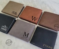 "Our leather engraved men's wallets are sure to be loved! They are perfect for gifting for any occasion. They also make wonderful groomsmen or gifts for dad! Each wallet is customized with front design of choice and option of inner text/message inside. These make great quality engraved gifts! Specs: -each wallet is 4.5\" x 3.5\" when closed and 8.5\" when opened -wallet is a bi-fold design with ID insert flap -each wallet is engraved for long lasting design -plenty of pockets and sleeves for mon Wallets For Boys, Custom Wallets, Leather Engraved, Mens Leather Accessories, Leather Engraving, Men's Wallets, Custom Wallet, Men's Wallet, Personalized Wallet