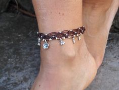 This listing is for one anklet. Beautiful macrame anklet. You can wear it alone or in combination with the barefoot sandals available in my shop (picture 2 and 3 or pictures 6 and 7) https://www.etsy.com/listing/248469036/earth-mandala-barefoot-sandals-foot?ga_search_query=earth&ref=shop_items_search_1 https://www.etsy.com/listing/502485027/tree-of-life-barefoot-sandals-brown-and?ga_search_query=tree+of+life&ref=shop_items_search_16 This anklet is made with waxed polyester cord, tibetan Adjustable Bracelet Anklets For Wedding, Adjustable Wedding Anklets, Silver Ankle Wrap Jewelry For Beach, Adjustable Anklets For Gift, Handmade Adjustable Anklets With Ankle Strap, Adjustable Handmade Anklets, Adjustable Toe Ring Bracelets For Beach, Macrame Anklet, Jewelry Hippie