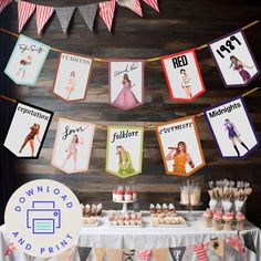 a table with cupcakes and desserts on it in front of a wooden wall