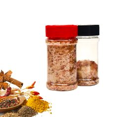 two jars filled with different types of spices