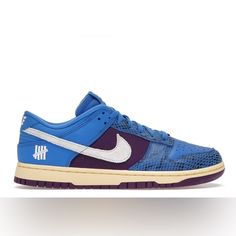 Nwb Nike Dunk Low Sp X Undefeated Dunk Vs Af1 '5 On It' Men's Dh6508-400 Size 7 Signal Blue/White Night Purple Introducing The Nike Dunk Low Sp X Undefeated Dunk Vs Af1 '5 On It' Men's Sneaker In Multicolor. This Stylish And High-Quality Nike Dunk Low Is A Must-Have For Any Athletic Shoe Collection. With A Low Top Shoe Shaft Style, The Nike Dunk Low Offers A Comfortable Fit While Providing The Support You Need For Your Daily Activities. The Shoe Is Part Of The Nike Dunk Product Line And Has A St Blue Running Shoes With Air Max Cushioning For Streetwear, Urban Style Blue Custom Sneakers With Boost Midsole, Blue Air Max Sneakers For Streetwear, Urban Style Blue High-top Custom Sneakers, Nike Blue High-top Skateboarding Sneakers, Urban Blue Basketball Shoes With Boost Midsole, Nike Blue Running Shoes For Streetwear, Urban Blue Custom Sneakers With Laces, Blue Urban Custom Sneakers With Laces