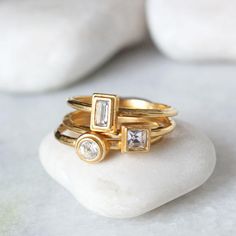 "April Birthstone Ring in Gold. Stacking Mothers Ring with Diamond color stone by Toozy. Perfect Personalized gift for April Birthday. Know someone with an April birthday ~ this is the perfect gift! Stackable birthstone rings are the IT accessory. Wear by itself or pair with with an initial ring! This listing is for one 24K gold vermeil stackable birthstone ring with a Swarovski crystal. Round, square, or rectangle stone settings are available. These rings are available in SILVER at this listing Jewelry Redesign, Mothers Ring Stackable, Recycled Gold Jewelry, Mothers Jewelry, Redesign Ideas, April Birthstone Ring, Stackable Birthstone Rings, Gold Bracelet Simple, Birthstone Stacking Rings