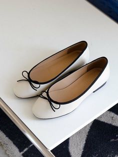 White Elegant Ballet Flats For Everyday, White Classic Ballet Flats, Classic White Pointed Toe Ballet Flats, White Round Toe Flats For Everyday, White Round Toe Flats, Classic White Low Heel Ballet Flats, Classic White Ballet Flats With Low Heel, White Low Heel Ballet Flats For Work, White Ballet Flats For Work With Low Heel