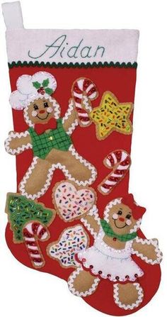 a christmas stocking with gingerbreads and other decorations