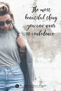 a woman in jeans and grey shirt with text that reads, the most beautiful thing you can wear is confidence