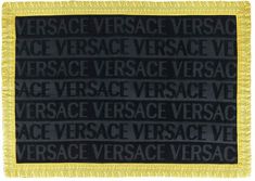 a black and yellow area rug with words on it