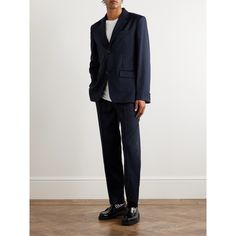 A.P.C. takes a minimalist approach when designing, so its tailoring is clean-lined and classic. This 'Harry' suit jacket is cut from wool with high notch lapels and a single vent. The darting at the middle gently tapers the shape. Modern Suits With Pressed Crease, Modern Suits With Concealed Placket, Modern Wool Suits For Business Casual, Modern Wool Suits For Work, Modern Single-breasted Suits, Modern Business Blazer With Structured Boning, Modern Blazer With Structured Boning For Business, Modern Wool Suits For Office, Modern Structured Blazer For Business