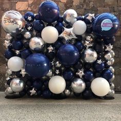 a bunch of balloons that are on the ground