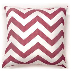 a red and white chevroned pillow