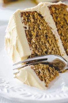 a slice of cake on a plate with a fork