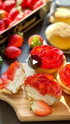 strawberry shortcakes and pastries on a cutting board