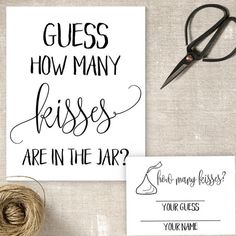 a pair of scissors next to a card that says guess how many kisses are in the jar?