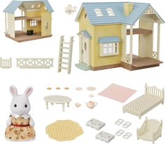 a doll house with furniture and accessories