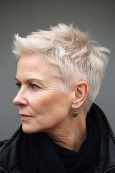 classic short hairstyle that exudes confidence and style. It’s incredibly low-maintenance and perfect for those who want a bold, yet stylish look. Cropped Pixie Haircut, Queer Hair, Short Spiky Haircuts, Short Hair Ideas, Choppy Hair, Short Grey Hair, Super Short Hair, Blonde Pixie Haircut, Short Choppy Hair