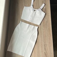 Guess Mirage Cutout Ottoman Crop Top & Ottoman Stitch Mirage Skirt Bodycon Bandage Set Size Xs - Crop Top Size Xs - Skirt Size Xs - Bandage/ Body-Con Fit - Stretchy - Secure & Lifted Bust - Zipper & Clasp In Back Of Top & Skirt - New With Tags/ Never Worn - 0 Defects! - Make An Offer! Fitted White Two-piece Set, Elegant White Mini Length Sets, White Chic Mini Sets, Chic White Mini Length Sets, White Sleeveless Sets For Night Out, White Mini Length Party Set, White Party Set Mini Length, White Party Sets With Mini Length, White Party Set In Mini Length