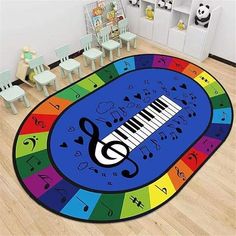 a colorful rug with musical notes on it in the middle of a child's room