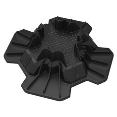 a black plastic object that looks like it is in the shape of a flower ornament