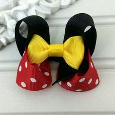 a close up of a minnie mouse hair bow