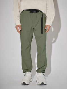 Editor's NoteOFFGRID's Ultimate Cordura Pants are made out of nylon and polyurethane fabric that has a high quality texture and structure. It can be styled as a set-up with Ultimate Cordura Packable Jacket. With adjustable string on the hem, you can easily adjust the silhouette, and can be worn by both male and female.- Belt on the waistline- String and Stopper on the hem- Straight silhouette- Wrinkle proof fabric Measurements (in.)S/M/L/XL/XXL- Length: 39.37 in / 39.96 in / 40.55 in / 40.94 in / 41.34 in- Waist: 13.39 in / 14.37 in / 15.35 in / 16.34 in / 17.32 in- Hip: 19.29 in / 20.28 in / 21.26 in / 22.24 in / 23.23 in- Thigh: 12.80 in / 13.29 in / 13.78 in / 14.27 in / 14.76 inModel info: Male - 5'10 Wearing size L, Female - 5'7, Wearing size SComposition & Care- Nylon 94% Po Nylon Parachute Pants With Belt Loops For Outdoor Activities, Green Relaxed Fit Cargo Pants, Functional Green Pants For Streetwear, Green Relaxed Fit Functional Bottoms, Functional Nylon Pants With Belt Loops, Nylon Outdoor Pants With Belt Loops, Nylon Pants With Belt Loops For Outdoor Activities, Nylon Pants With Belt Loops For Outdoor, Khaki Techwear Pants With Elastic Waistband