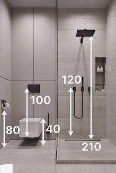 a bathroom with measurements for the shower head