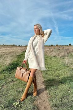 Our versatile Woodstock cable knit dress is just as comfortable as it looks. The cable knit fabric creates a relaxed fit while the soft high neck ensures you’ll feel comfortable and cosy all winter. Detailed with our signature branded gold logo. Wear with your favoruite knee high boots and accessorise with our cream Hexham Scarf for the ultimate chic seasonal look. DETAILS 42% Acrylic 30% Polyester 28% Nylon Detailed with our signature branded gold logo wash on 30 degrees Outfit Con Botas Cafe, Cable Knit Dress Outfit, Planned Outfits, Cable Knit Jumper Dress, Knitted Dress Outfit, Knit Jumper Dress, Cable Knit Dress, Knitted Jumper Dress, Logo Wear