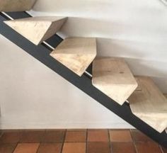 the stairs are made out of wood and metal