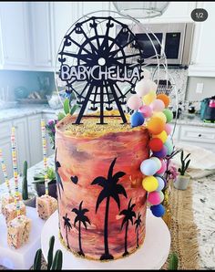 a cake decorated with palm trees and the words babychella on top is surrounded by other desserts