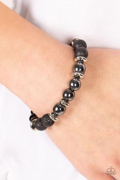 Infused with a section of polished black beads, a stellar assortment of gunmetal beads, silver accents, and black lava rock beads are threaded along stretchy bands around the wrist for an urban flair.   Sold as one individual bracelet.  2/8/21 Lava Rock Bracelet, Urban Jewelry, Lava Bracelet, Oil Spill, Bracelet Online, Lava Rock, Black Bracelets, Paparazzi Accessories, Baby Powder