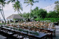 an outdoor dining area with tables and chairs