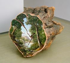 a piece of wood with trees on it