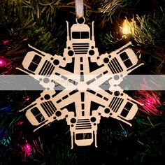 a wooden ornament hanging on a christmas tree