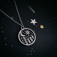 "This Starry Night in the Forest pendant necklace will add a beautiful, subtle sparkle to any look! Its simple design features a regal opal star, delicate pine trees, and a crescent moon. Small but elegant, this necklace is perfect for day or night. Size & Materials Pendant Size: 3/4\" (20mm) Chain length: 18\" (46cm) Materials: rhodium plated brass, Ethiopian opal Please remember - this piece is created with natural stones, each different from the next. This means that your piece will vary in a Starry Forest, Night In The Forest, Jewellery Simple, Night Necklace, Discounts For Teachers, Simple Silver Jewelry, Forest Night, Celestial Jewelry, Cute Bracelets