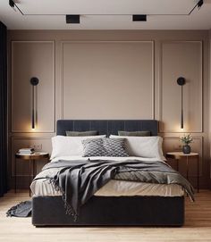 a large bed sitting in the middle of a bedroom next to two tables and lamps