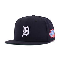 New Era Cap 59Fifty fitted hat for the Detroit Tigers in navy colorway, featuring 1984 World Series side patch. Celebrate the Detroit Tigers and their 1984 World Series championship with this very special retro on-field from Hat Heaven. Unearthed from New Era archives, this cap is designed with left-sided side patches, which were the norm up until 2016. The absence of New Era side flags brings a breath of fresh air to this classic design, along with the omission of the rear MLB batterman, which Navy Fitted Hat With Flat Brim For Baseball Season, Navy Flat Brim Fitted Hat For Baseball Season, Navy Snapback Fitted Hat For Baseball Season, Navy Fitted Hat For Baseball Season Streetwear, Navy Fitted Hat For Sports Events, Navy Flat Bill Hat For Sports Events, Navy Fitted Hat With Flat Bill For Sports Events, Navy Flat Bill Fitted Hat For Sports Events, Collegiate Navy Baseball Cap With Flat Bill