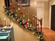 christmas decorations on the bannister and stair rail