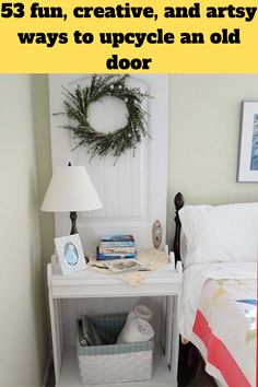 a bedroom with a bed, nightstand and lamp on it's side table in front of the door