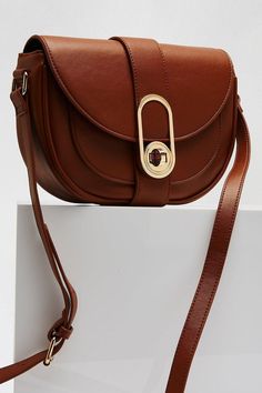 Our brown 'Cadiz' saddle cross body bag is must for your wardrobe. 100% Polyurethane. Wide Fit Shoes, Designer Belts, Bvlgari Bags, Celine Bag, Chloe Bag, Cadiz, Saddle Bag, Replica Handbags, Bags Purses