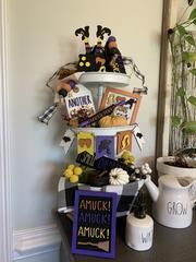 a table topped with lots of halloween decorations and cards on top of eachother