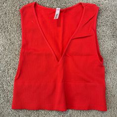 Never Worn Without Tags Cropped Ribbed Tank Top Red Seamless Top For Spring, Red Seamless Tank Top For Spring, Red Seamless V-neck Top, Red Cropped Stretch Tank Top, Red Stretch Cropped Tank Top, Stretch Red Cropped Tank Top, Red Seamless Crop Top Tank, Trendy Red Seamless Tops, Red Ribbed Sleeveless Crop Top