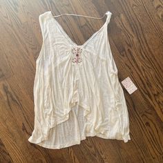 Brand New Beaded Floaty Tank From Free People. Brand New And Unworn. Embellished Cream Top For Summer, Casual Beaded Tops For Summer, Summer Beaded Beige Tops, Summer White Beaded Top, Beaded Beige Tops For Summer, Summer Beige Beaded Tops, Casual Beaded Tops For Beach, Casual Beaded Tops For The Beach, White Beaded Top For Summer