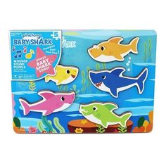 baby shark magnets in a box with water and sea animals on the bottom one